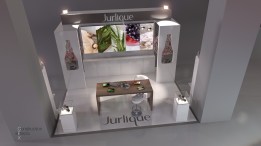 Jurlique stand with table, chairs, product and back illumination