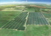 Aerial view of solar fields in farmland
